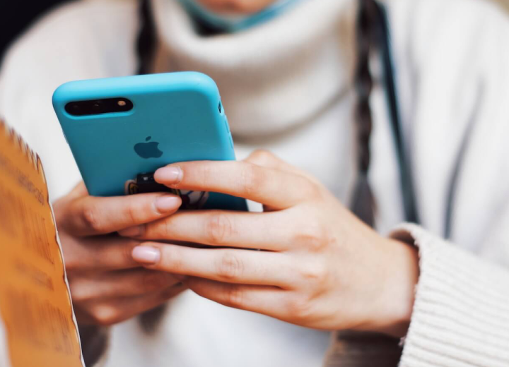 Person holding an iPhone